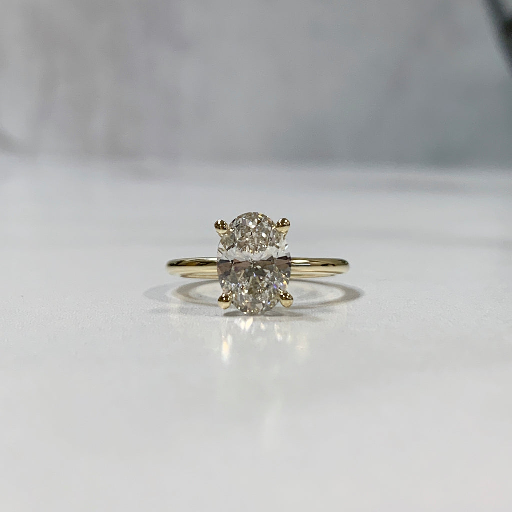 Classic yellow gold oval lab grown diamond engagement ring