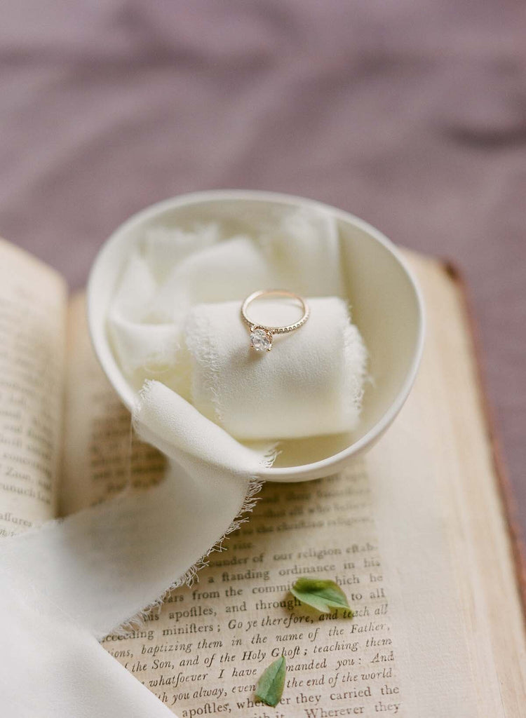 Engagement Ring in white bowl 