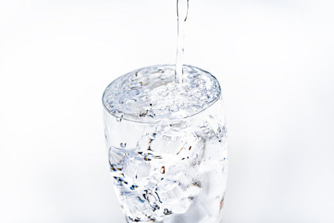 The Ultimate Power Couple: Peptides and Hyaluronic Acid. A glass of fresh water