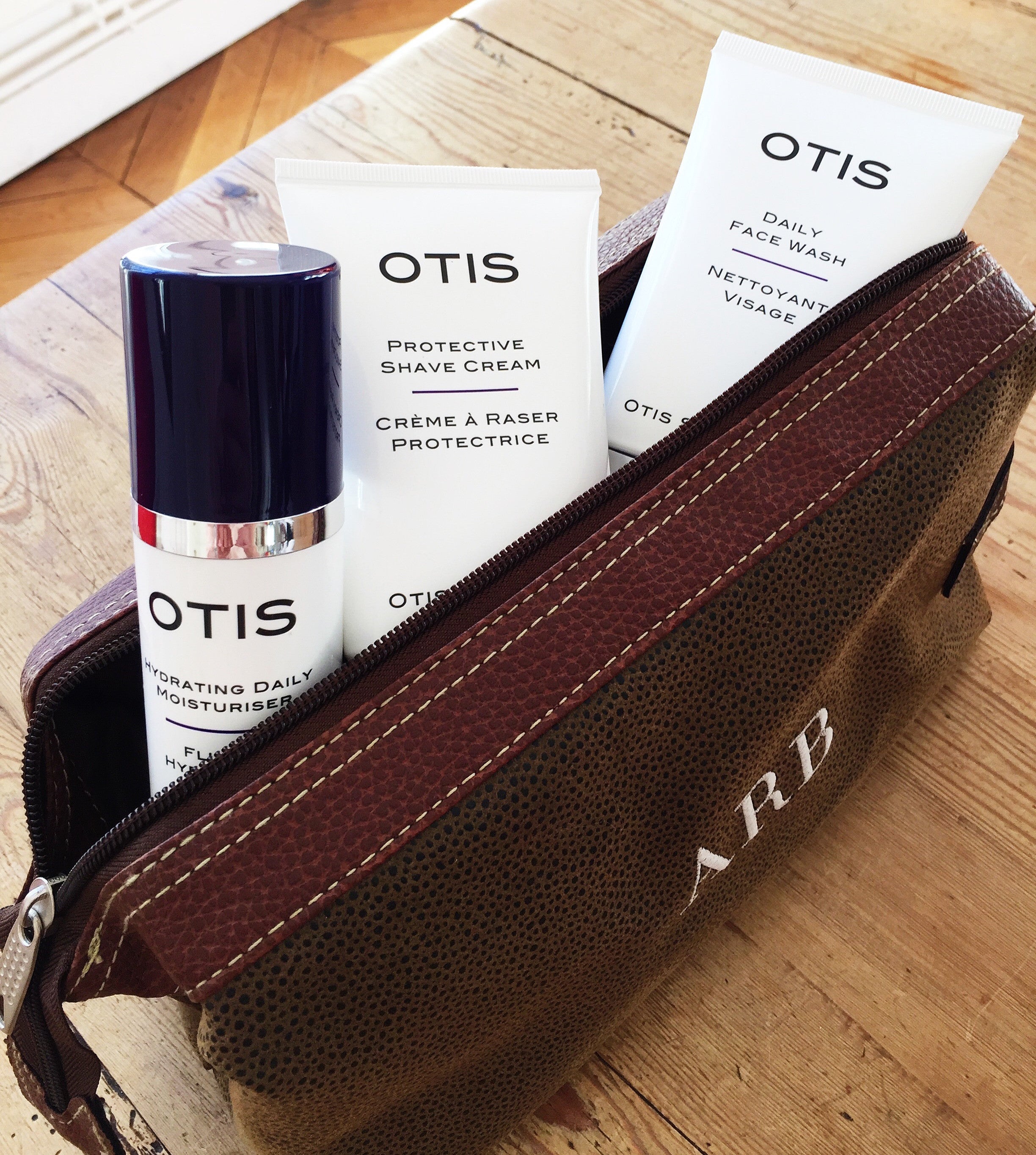 Why Your Skin Needs an Anti-Pollution Defense. Otis Skincare products in wash bag to protect against pollution