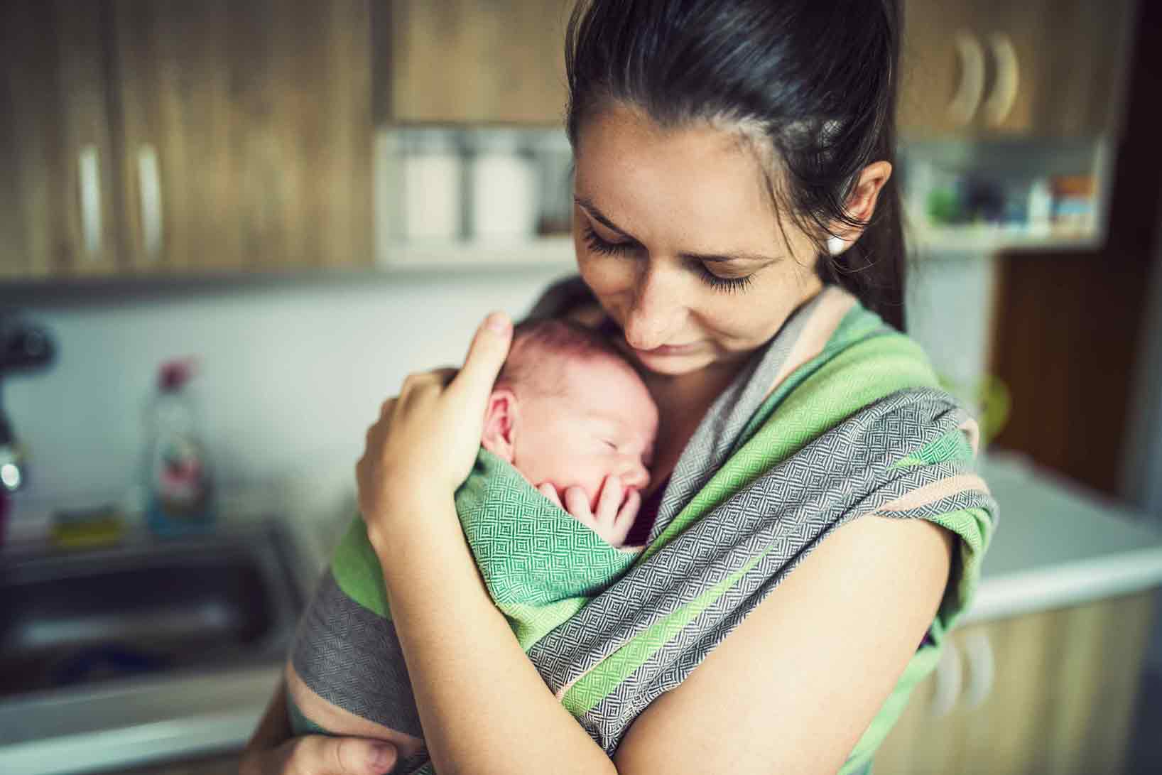 physiological benefits of baby wearing