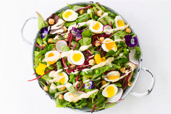 Nutritious salad representing the nutritients your body needs in order for you to maxmisize your health