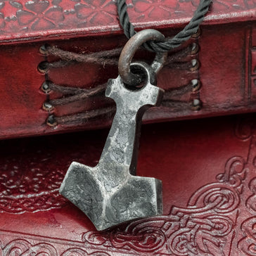 https://cdn.shopify.com/s/files/1/2022/8291/products/viking-norse-nordic-larp-skullvikings-hand-forged-thors-hammer-mjolnir-pendant-uk_1.jpg?v=1590314551&width=364