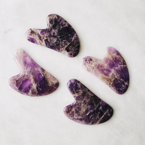 The Mount Lai Amethyst Gua Sha Tool. Promote lymphatic drainage and naturally glowing skin with Mount Lai products.