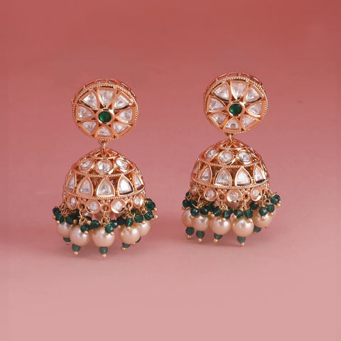 A close up image of a pair of Kundan jhumkasa