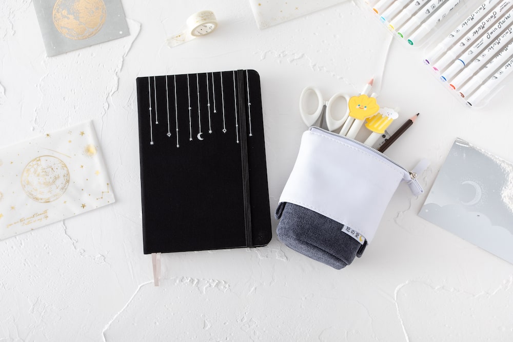 notebook + pencil case