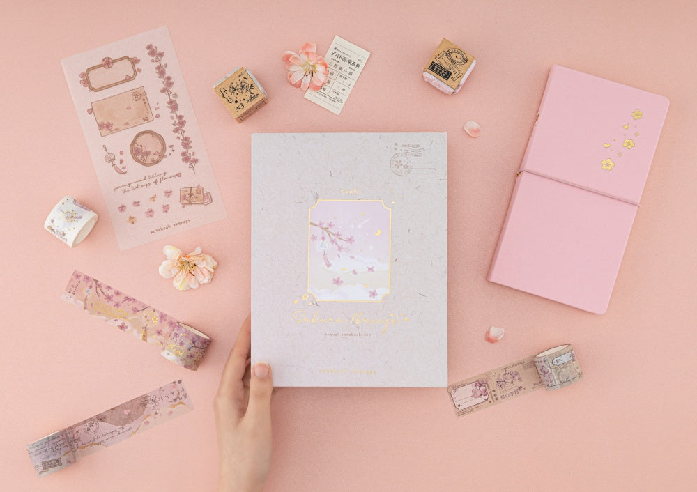 Sakura Breeze Travel Notebook Gift Set on pink background