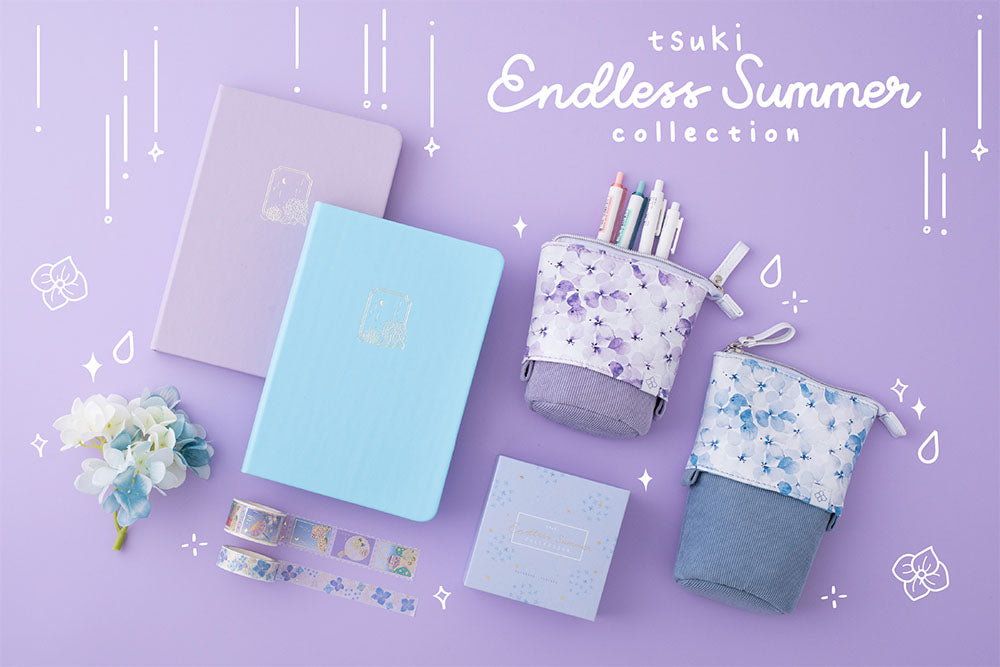 Tsuki Endless Summer collection pop-up pencil cases with Tsuki Endless Summer Limited Edition Bullet Journals and Tsuki Endless Summer Washi Tape set with blue and white hydrangea flowers on lilac background