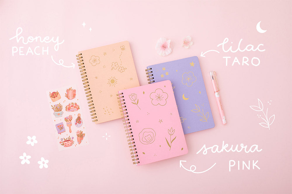 Tsuki Floral collection 3 ringbound bujos laid out on pink background