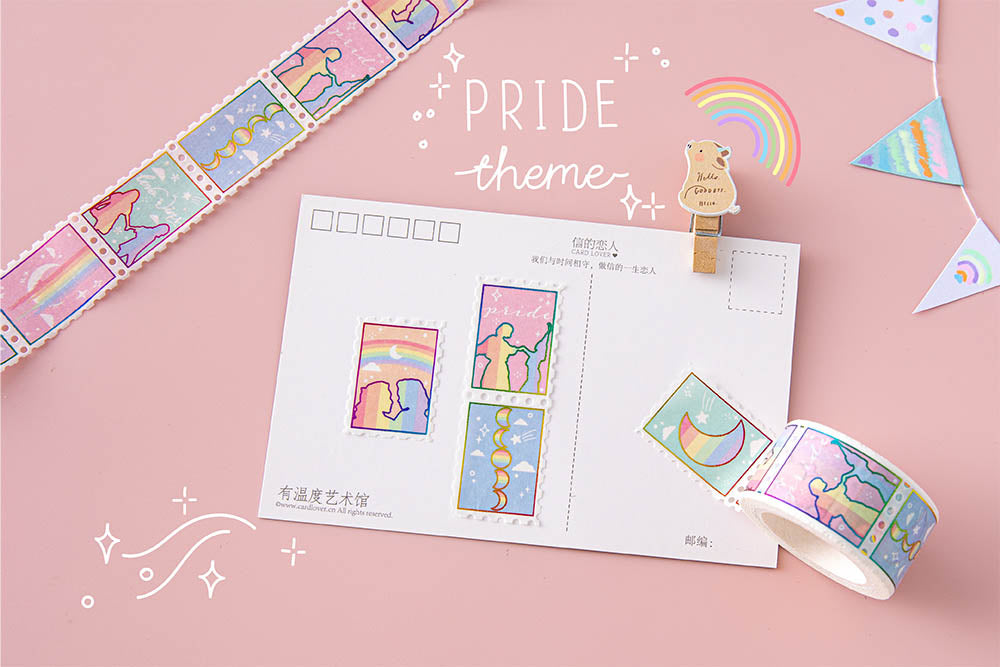 Tsuki Rainbow Pride Washi Tape with Pride theme with wooden bear peg and postcard on light pink background