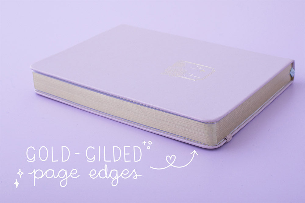 Tsuki Endless Summer Limited Edition Bullet Journal in Lilac Bloom with gold gilded page edges on lilac background