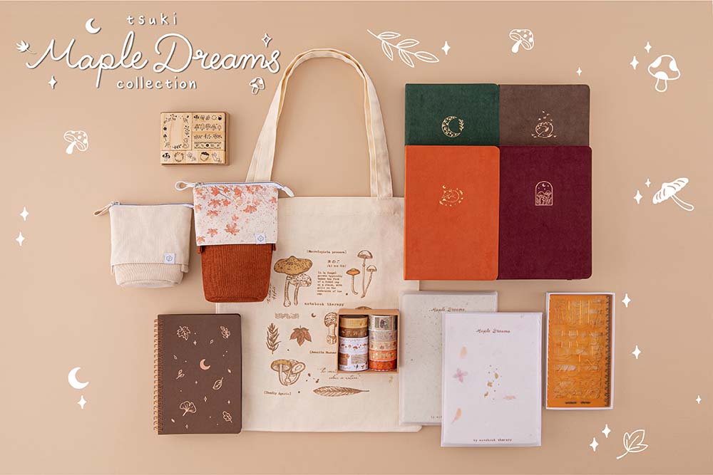 Tsuki Maple Dreams Collection including Tsuki ‘Kitsune’ Limited Edition Fox Bullet Journal and Tsuki ‘Nara’ Limited Edition Bullet Journal and Tsuki ‘Kinoko’ Limited Edition Bullet Journal and Tsuki ‘Midnight Garden’ Limited Edition Bullet Journal with Tsuki ‘Maple Dreams’ Washi Tapes Set and Tsuki ‘Maple Dreams’ Bullet Journal Stamp Set and Tsuki ‘Vintage Kinoko’ Tote Bag and Tsuki Bullet Journal Stencil Set in Neutral and Tsuki ‘Maple Dreams’ Kraft Paper Limited Edition Bullet Journals and Tsuki ‘Maple Dreams’ Ringbound Bullet Journal and Tsuki ‘Maple Dreams’ Pop Up Pencil Cases in maple and stone and Tsuki Mixed Scrapbook Paper Pack and Tsuki Handmade Petal Paper Pack on cream background
