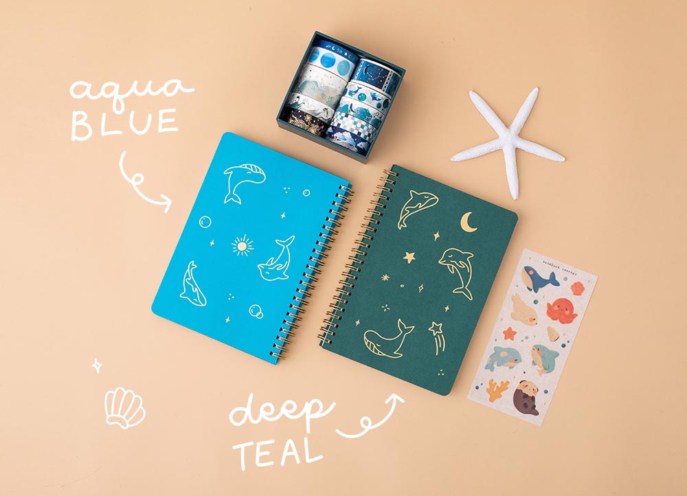 Tsuki Ocean Edition Ring Bound notebooks in aqua blue and deep teal with free sticker sheet and ocean edition washi tapes and sticker set with starfish on peach background