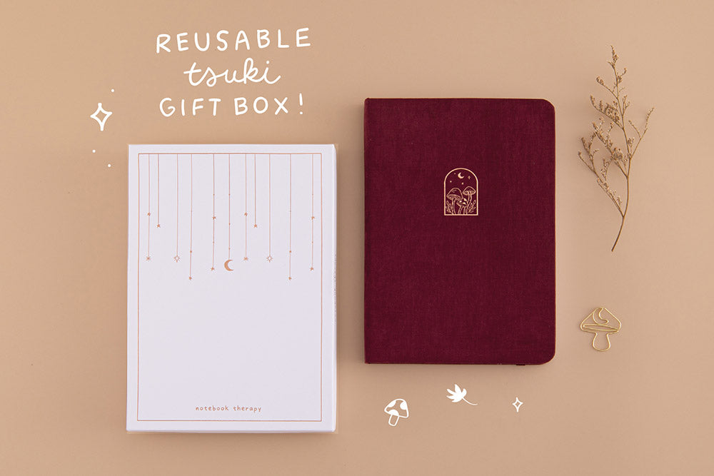Tsuki ‘Kinoko’ Limited Edition Bullet Journal with reusable tsuki gift box and free paperclip gift with dried flowers on beige background