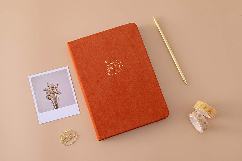 Tsuki ‘Kitsune’ Limited Edition Fox Bullet Journal with free paperclip gift with Tsuki ‘Maple Dreams’ Washi Tapes and gold pen and dried flowers on beige background