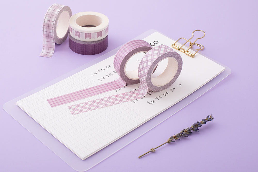 Tsuki Core Washi Tape Set in Cool Neutral with lavender flowers on white clipboard on lilac background