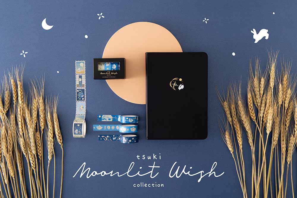 Tsuki Moonlit Wish Collection with Tsuki ‘Moonlit Wish’ Limited Edition Bullet Journal and Tsuki ‘Moonlit Wish’ Washi Tapes Set with wheat reeds on light brown circle on dark blue background