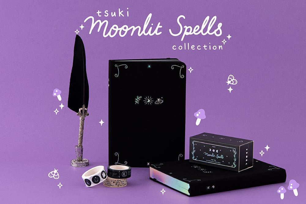 Tsuki ‘Moonlit Spell’ Collection with black feather quill in purple background