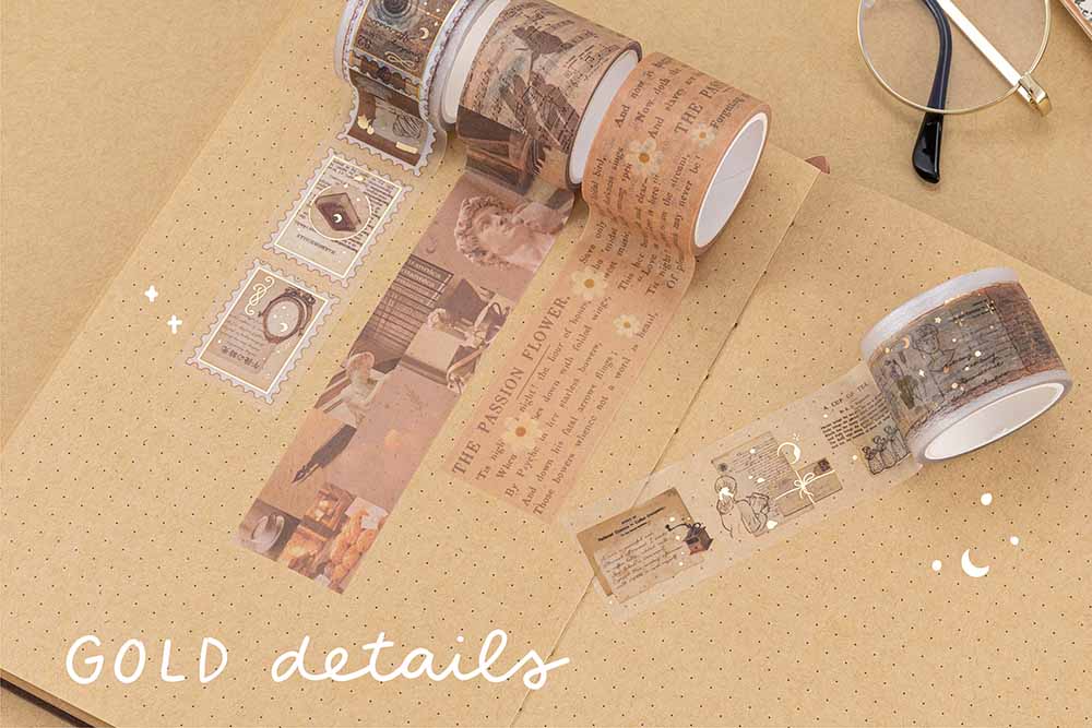 Tsuki Light Academia PET stamp tape roll, collage washi roll, book text washi roll, PET roll on kraft paper bullet journal with ‘gold details’ written in white