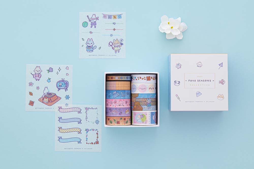 Tsuki ‘Four Seasons’ Washi Tape Set by Notebook Therapy x Milkkoyo with three free stickers sheets with white flower on light blue background