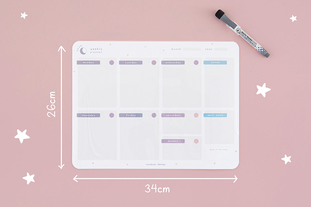 Tsuki Reusable Weekly Planner measuring 34 x 26 cm with dry erase marker on light pink background