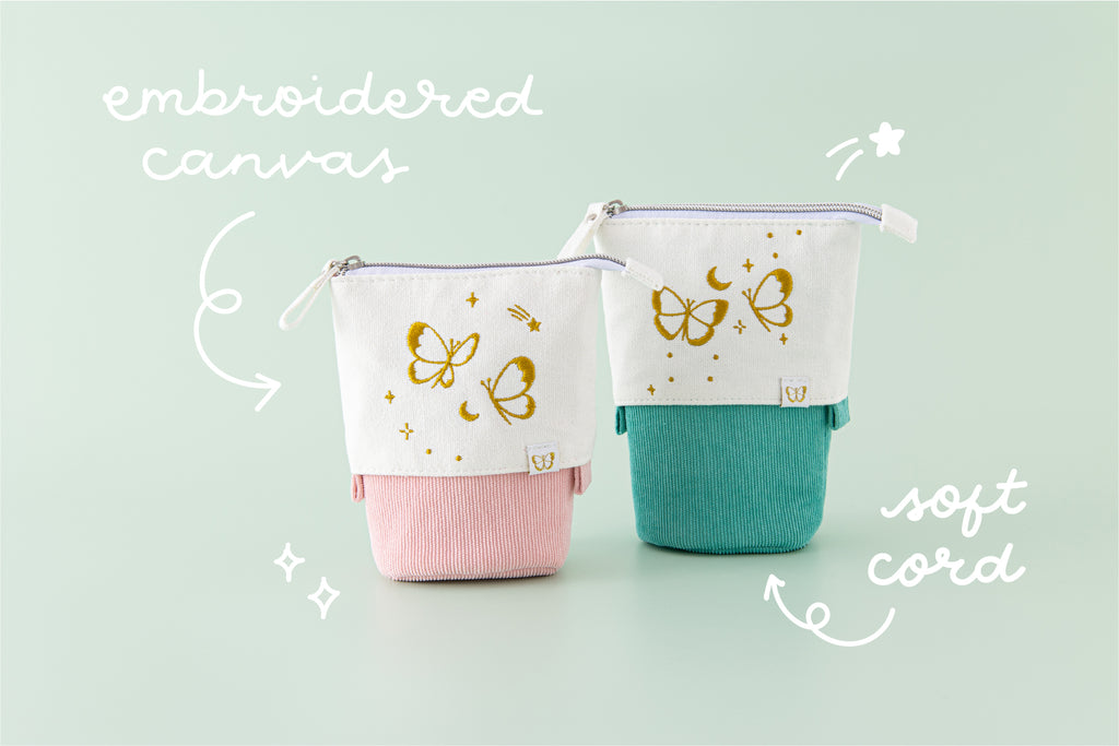 Tsuki ‘Flutter + Dream’ Pop-Up Pencil Cases by Notebook Therapy x Pelinkan in teal and pastel pink with embroidered canvas and soft cord in mint background