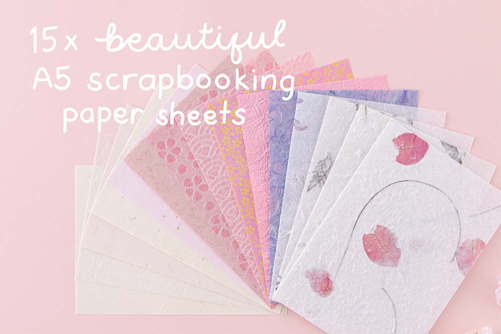 Tsuki ‘Sakura Journey’ Scrapbooking Set with fifteen beautiful scrapbooking sheets on pink background