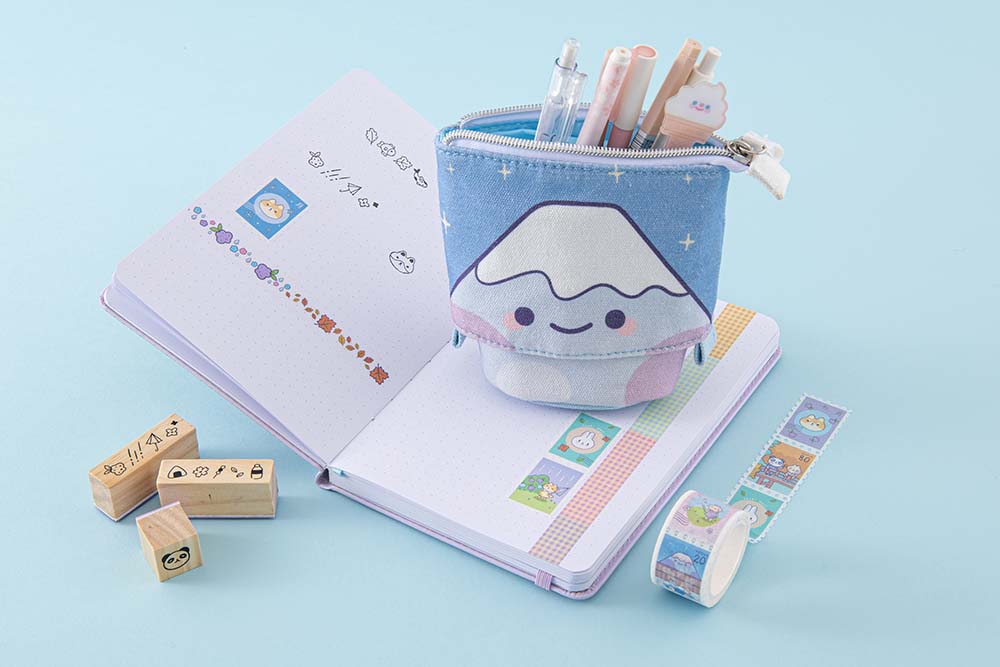 Tsuki ‘Four Seasons’ Fuji Pop-Up Pencil Case by Notebook Therapy x Milkkoyo on open bullet journal page spread with Tsuki ‘Four Seasons’ Washi Tapes and Tsuki ‘Four Seasons: Bullet Journal Stamps on light blue background