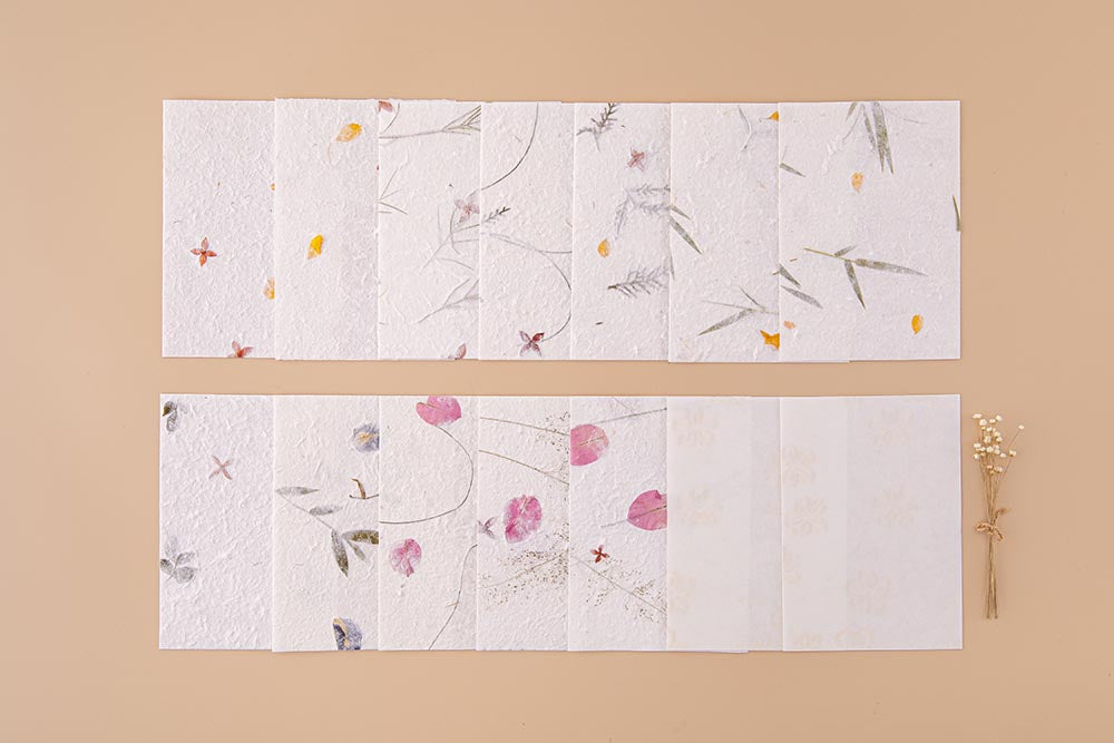 Tsuki Handmade Petal Papers with dried flowers on beige background