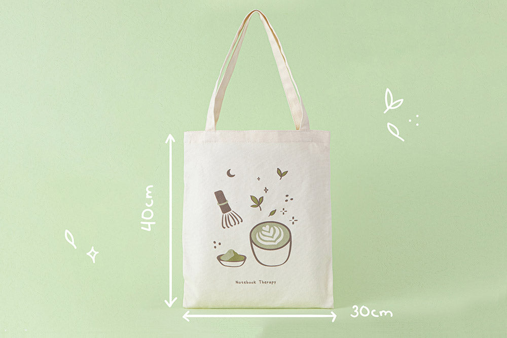 Tsuki ‘Matcha Matcha’ Tote Bag measuring 30 cm by 40 cm in matcha green background