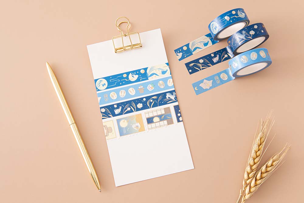 Tsuki ‘Moonlit Wish’ Washi Tapes on white clipboard with gold pen and wheat reeds on light brown background