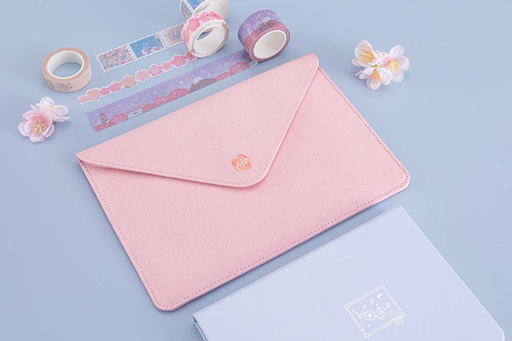 Tsuki ‘Sakura Journey’ Notebook Pouch with Tsuki ‘Sakura Journey’ Washi Tapes with Tsuki ‘Sakura Journey’ Limited Edition Bullet Journal with cherry blossoms on light blue background