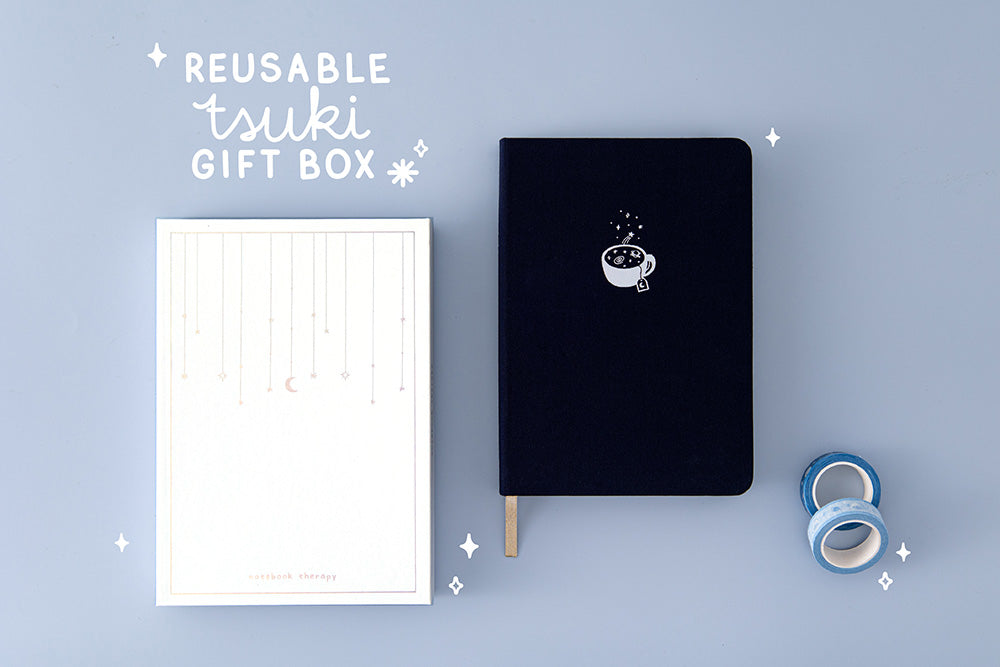 Tsuki ‘Cup of Galaxy’ Limited Edition Holographic Bullet Journal with luxury eco-friendly reusable gift box and Tsuki ‘Cup of Galaxy’ Washi tapes on light blue background