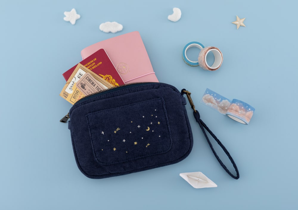 Tsuki ‘Cloud Dreamland’ Travel Pouch with Tsuki ‘Sakura Journey’ Limited Edition Travel Notebook, passport and tickets inside