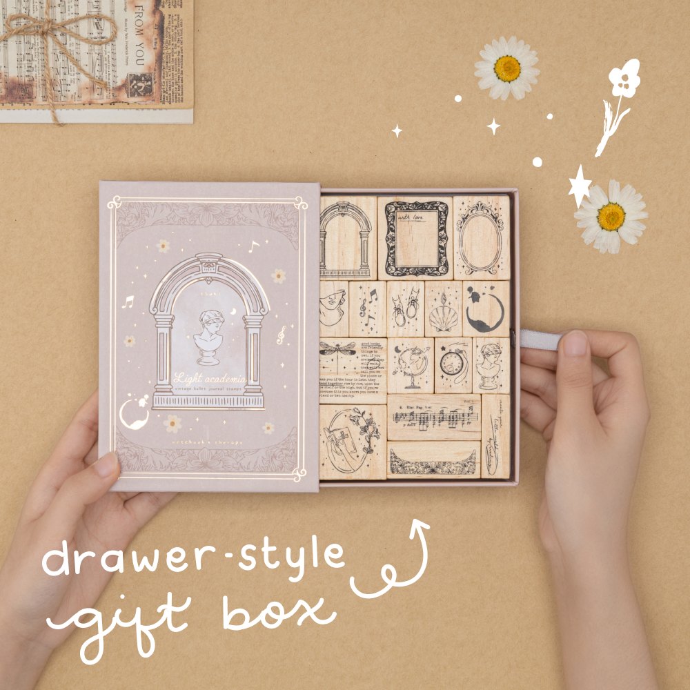 Drawer style gift box lettering in white and an arrow pointing at Light Academia stamp set box