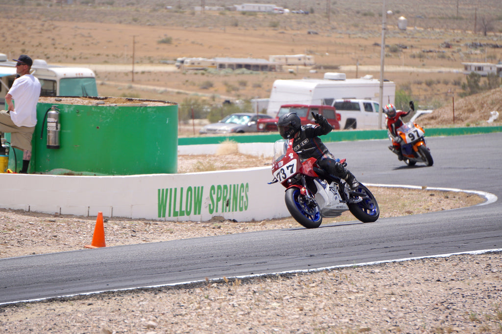 Hollywood Electrics Racer Jeff Clark on the H.E. Custom Zero SR with Fairing, coming out of the Omega at Willow Springs after AHRAM "Formula Lightning" Race on April 27, 2019.