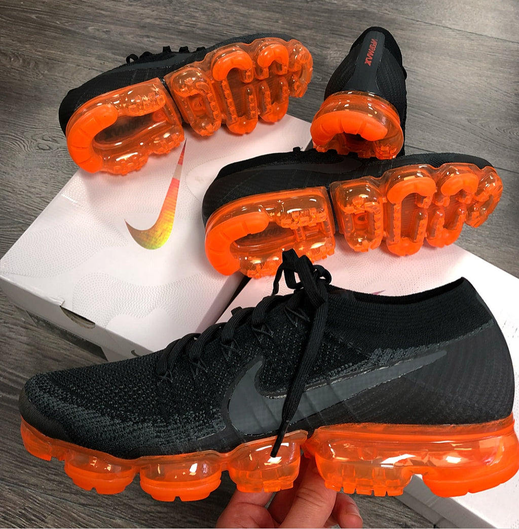 vapormax negras y naranjas