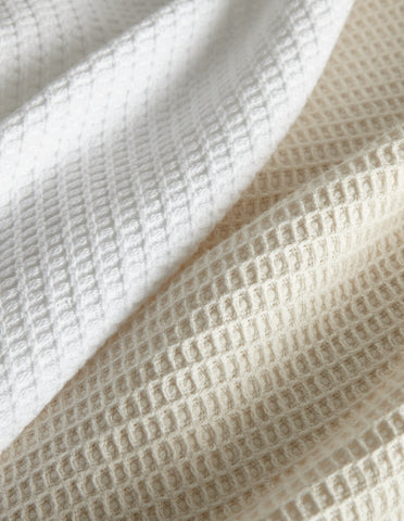 The texture of Riviera Waffle Weave Blanket for summer. | Peacock Alley