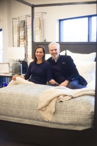 Mara Miller & Jesse Carrier posing with their bedding design