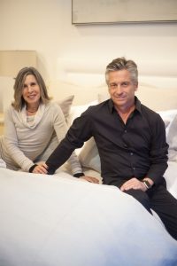 Brooke & Steve Giannetti posing with their bedding design