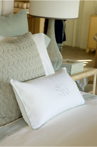 Closeup of pillows in various shades and textures