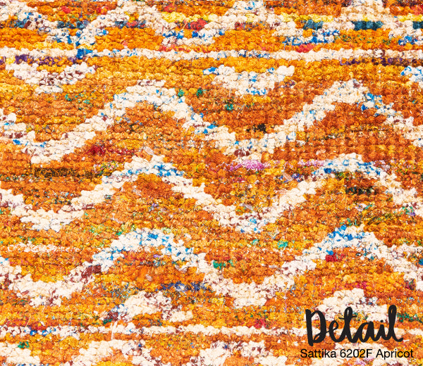 Sattika apricot and white tribal patterned rug detail