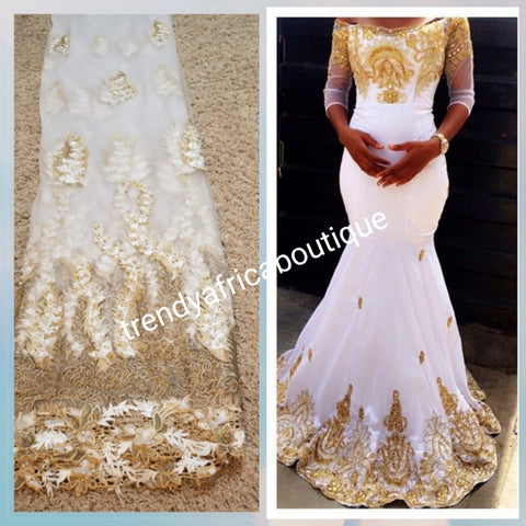 gold and white traditional attire