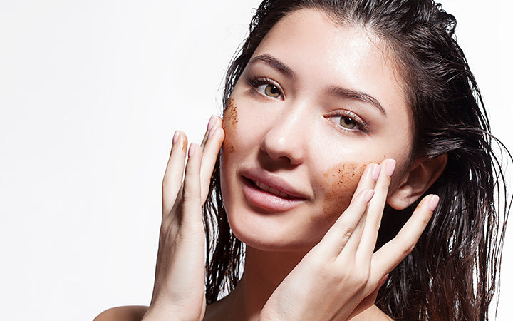 Young woman doing exfoliating