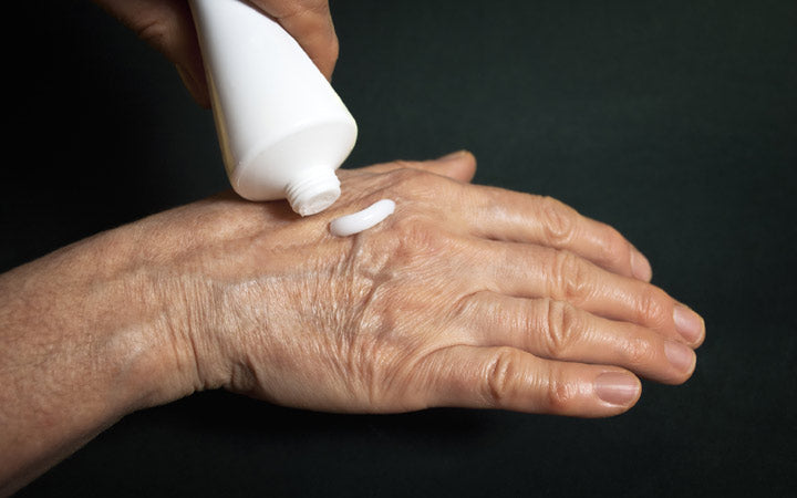 applying cream for hands