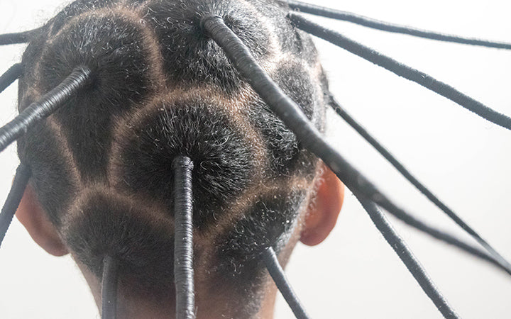 close up of nigerian indigenous hairstyle called threading