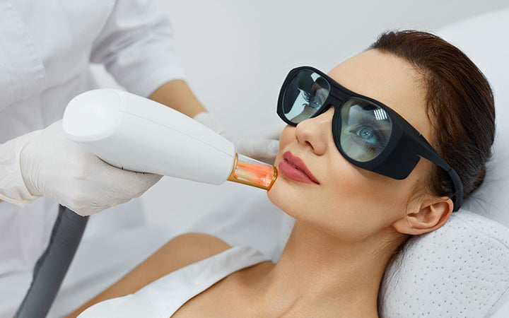 cosmetic laser procedures beautician uses skin