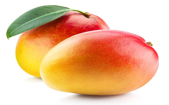 two ripe mangoes on white background