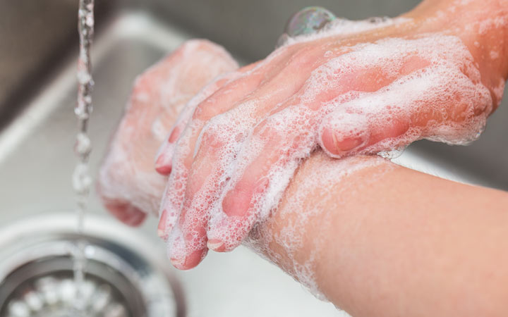 washing hands with soap