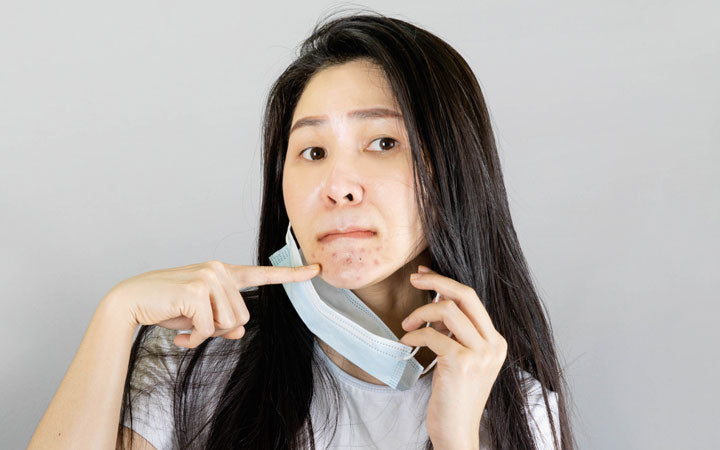 young asian woman wearing medical face mask